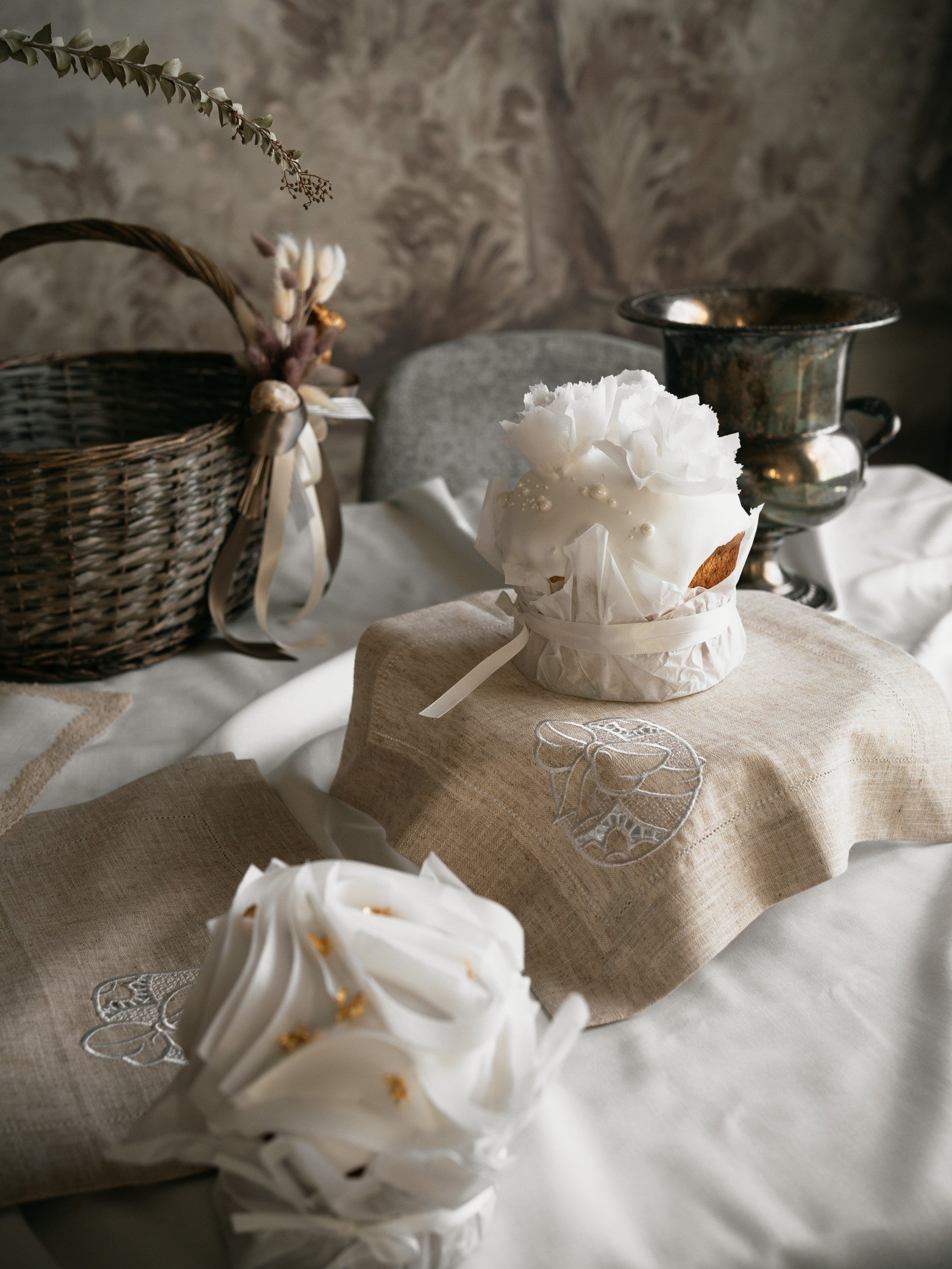 linen napkin with egg embroidery detail close up